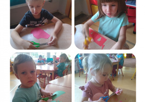 dzieci siedzą przy stoliku i wycinają różne kształty z papieru