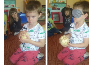 chłopiec z zamkniętymi oczami odgaduje jakie trzyma przed sobą warzywo