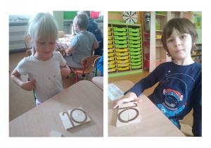 dzieci układają poznaną literę z drewnianych klocków